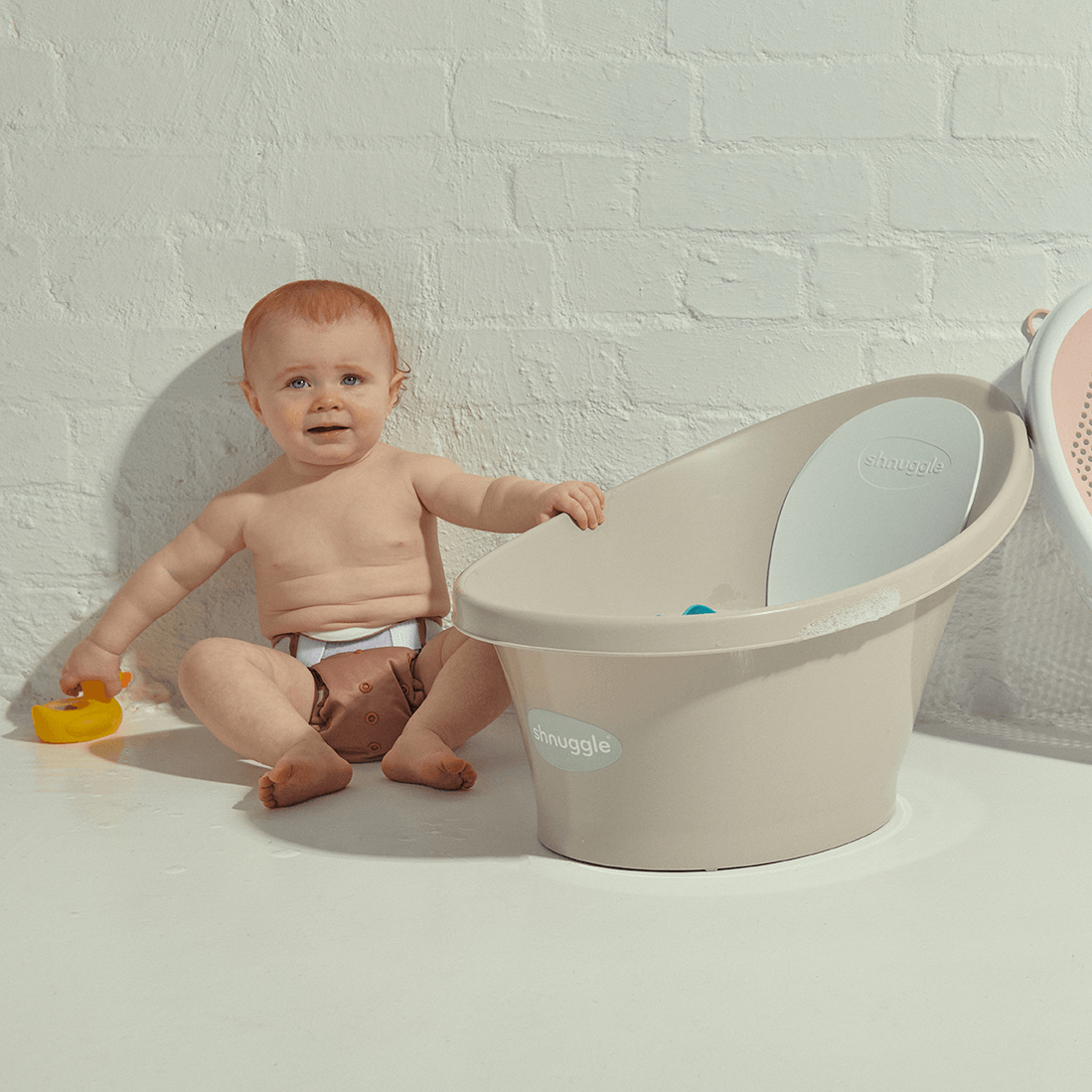 Support pour baignoire bébé Shnuggle