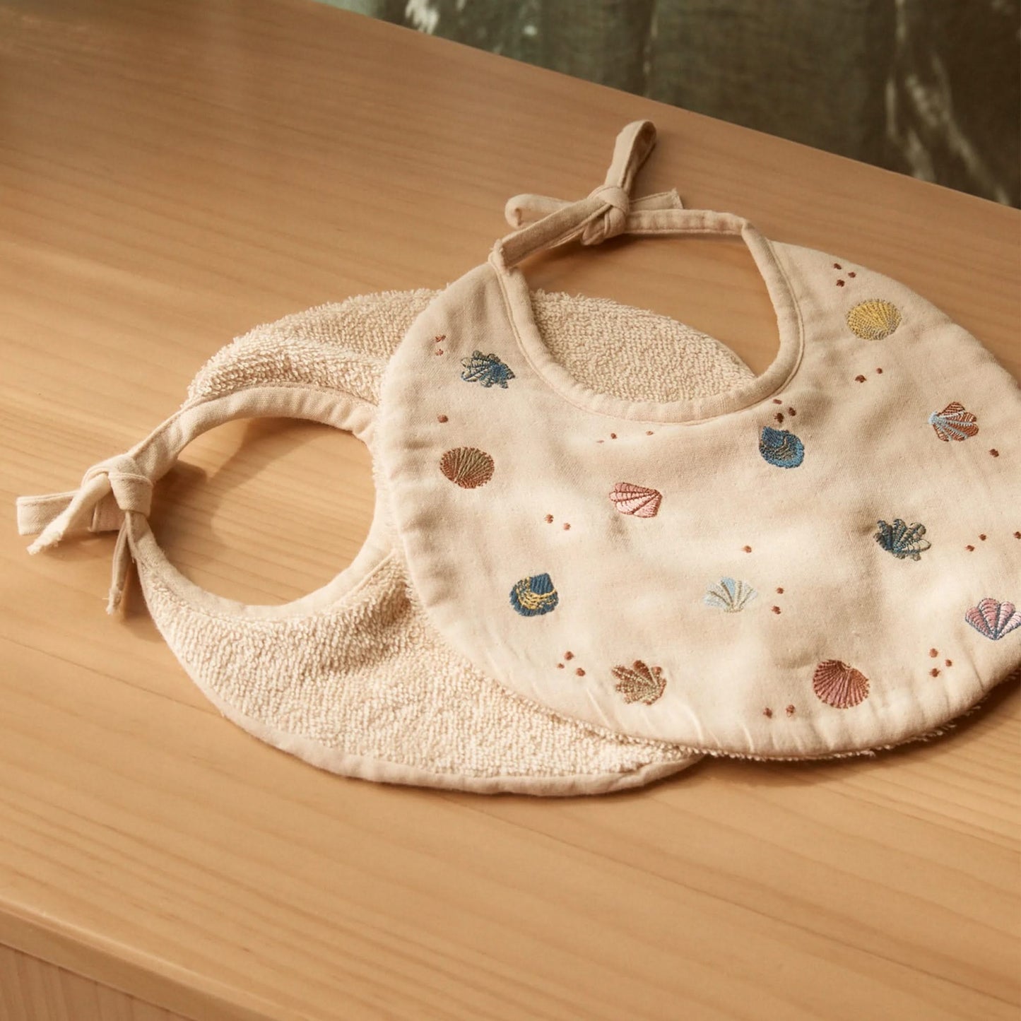 Phile Embroidered Bib