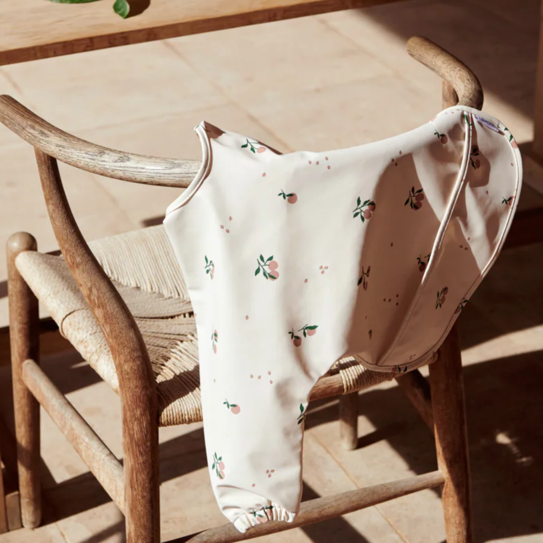 Merle Cape Bib - Peach/Sea Shell Mix