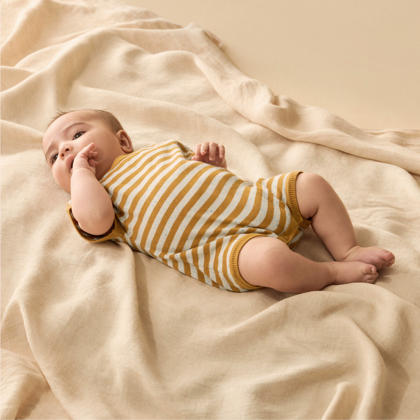 Organic Knitted Growsuit - Golden Wave Stripe