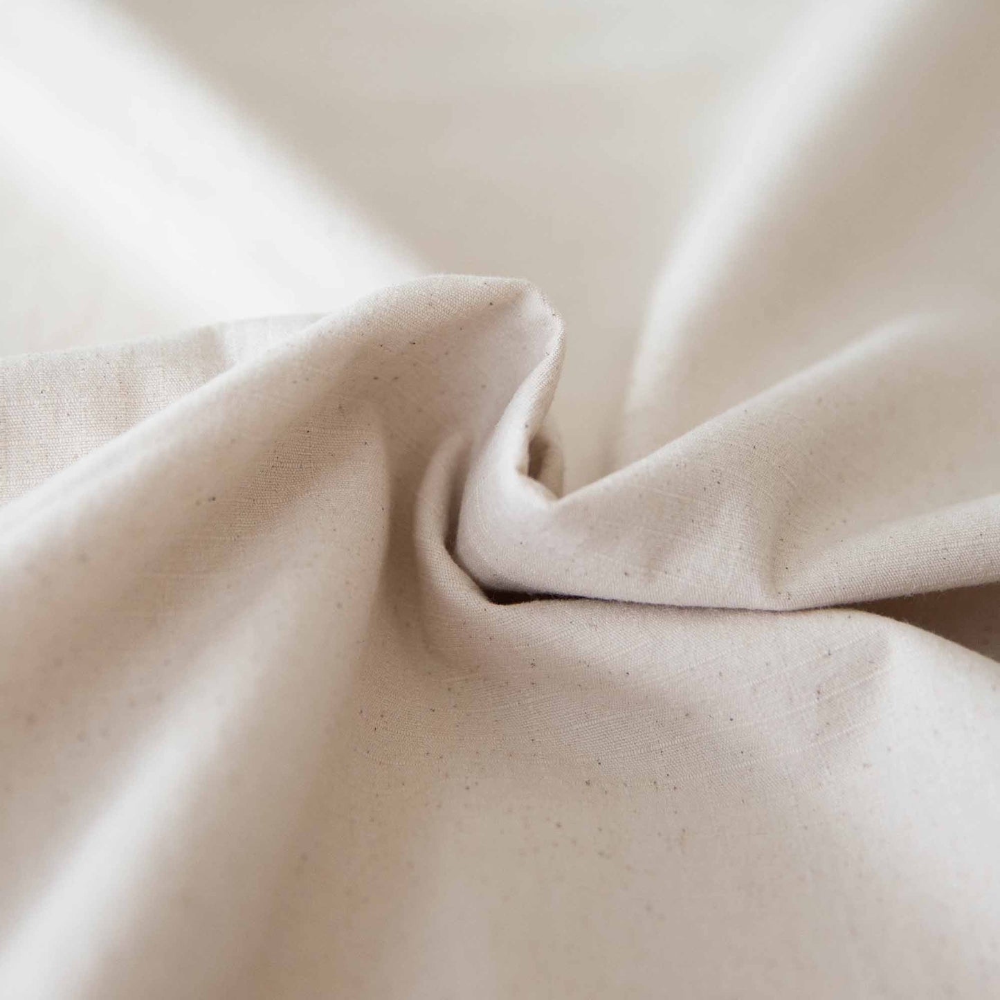 Soft, breathable cotton fabric of the Light Natural Padded Play Mat, showing a smooth finish.