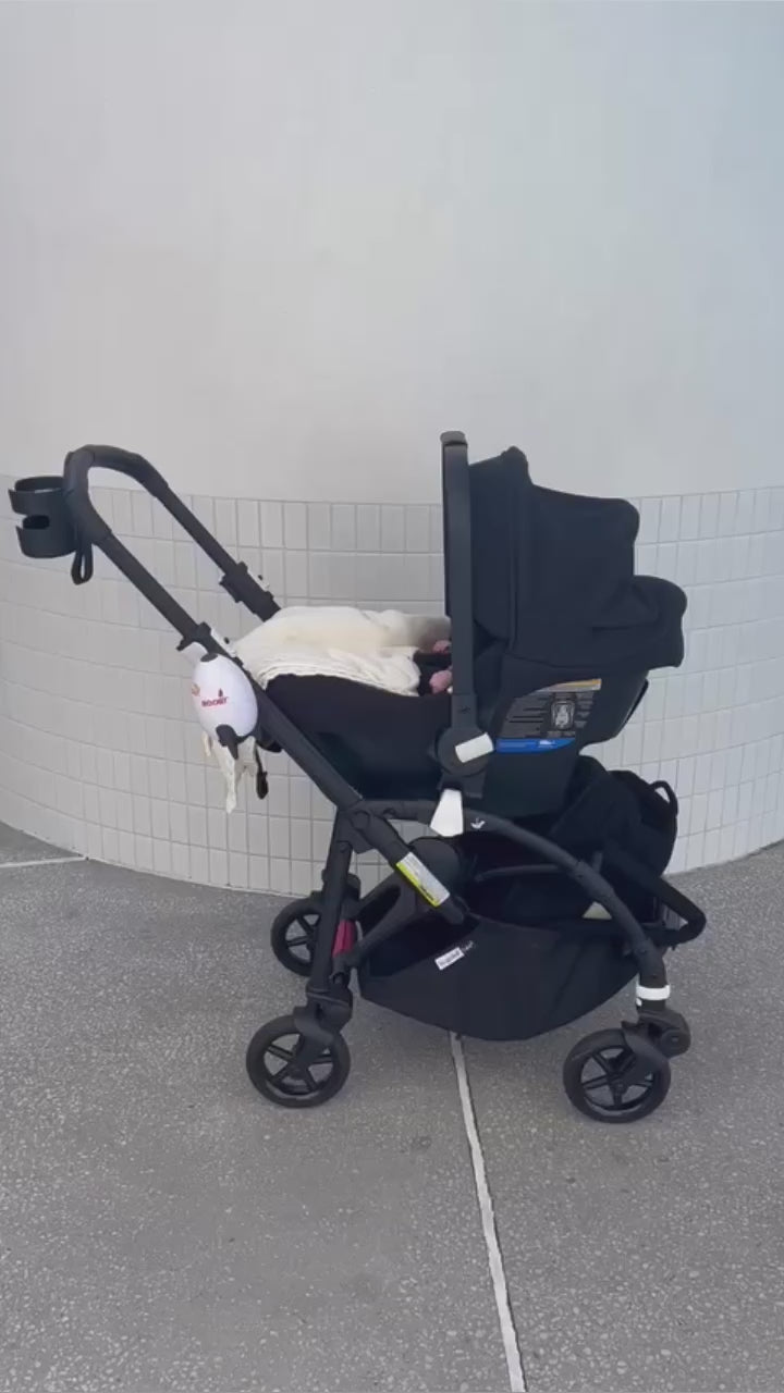 Automatic clearance pram rocker