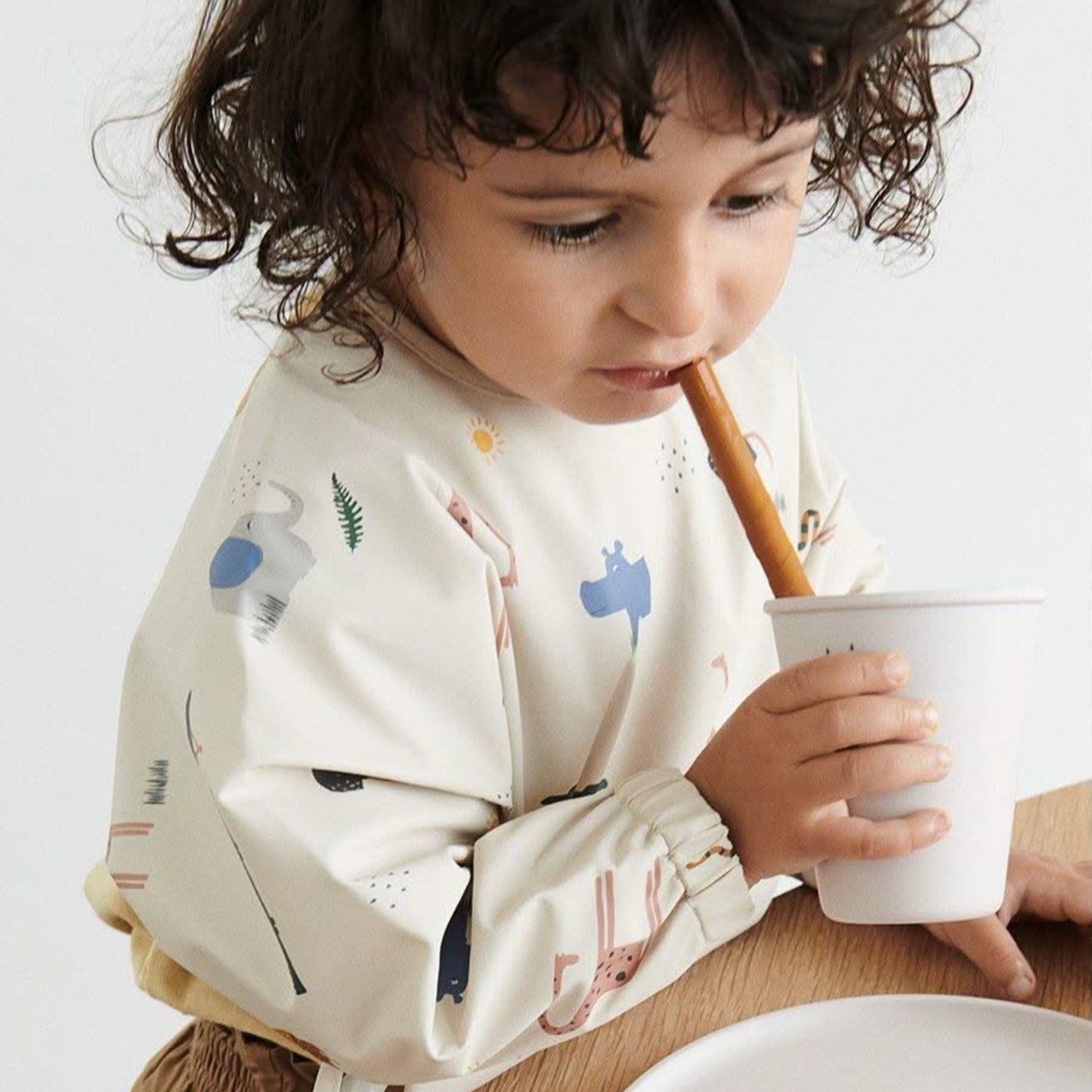 Merle Cape Bib - Safari Sandy Mix